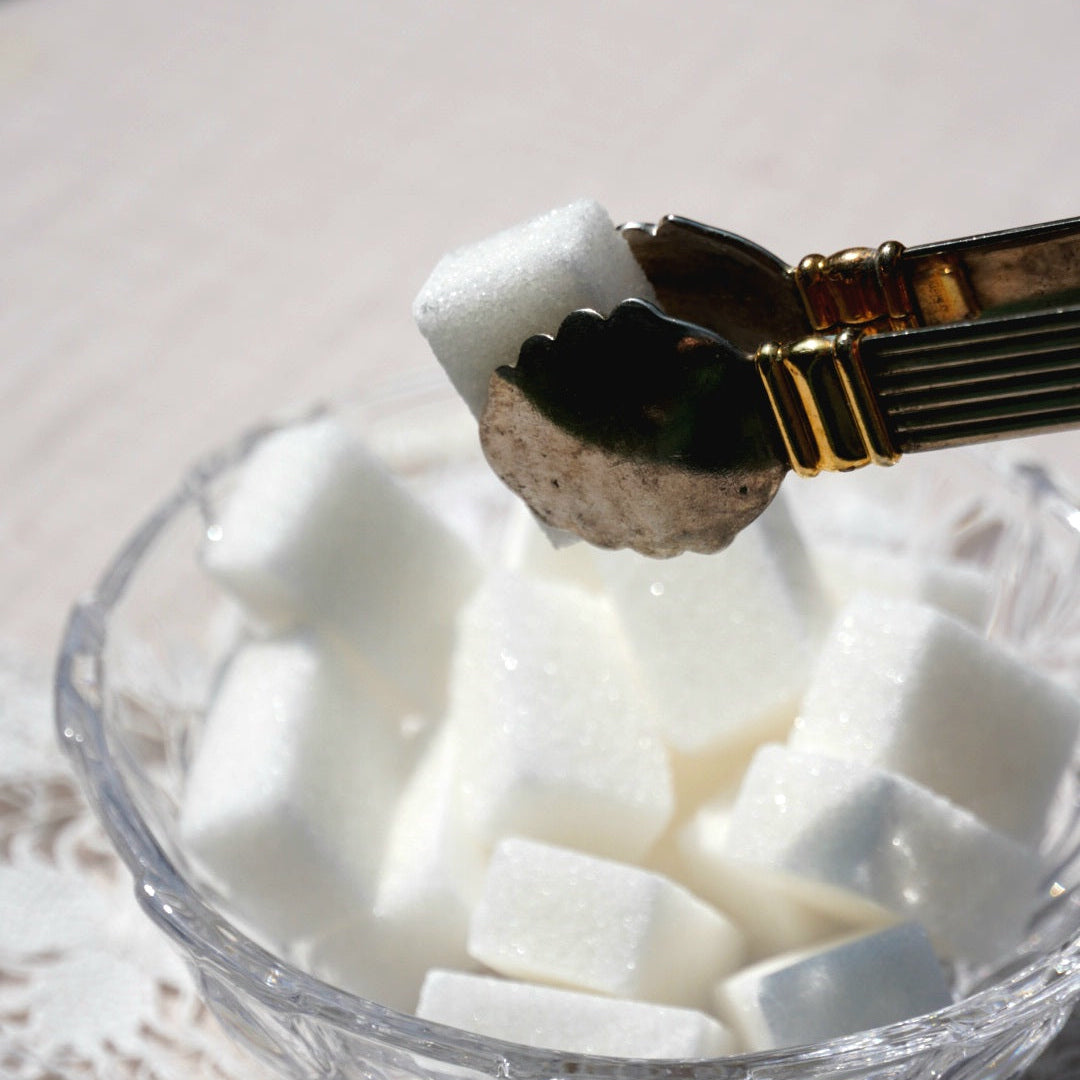 Pince à sucre "Mérélise" en métal doré et argenté