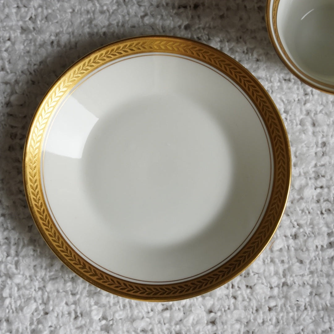 Petite tasse "Béryl" en porcelaine de Limoges dorée année 1931