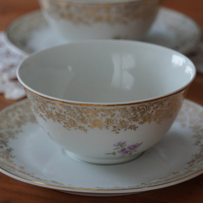 Tête-à-tête de tasses "Aliette" en porcelaine de Chauvigny fleurie et dorée F.D.