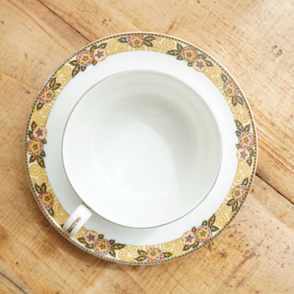 Grande tasse "Séphine" en porcelaine de Limoges couronnes motifs floraux orangés, jaunes et noirs