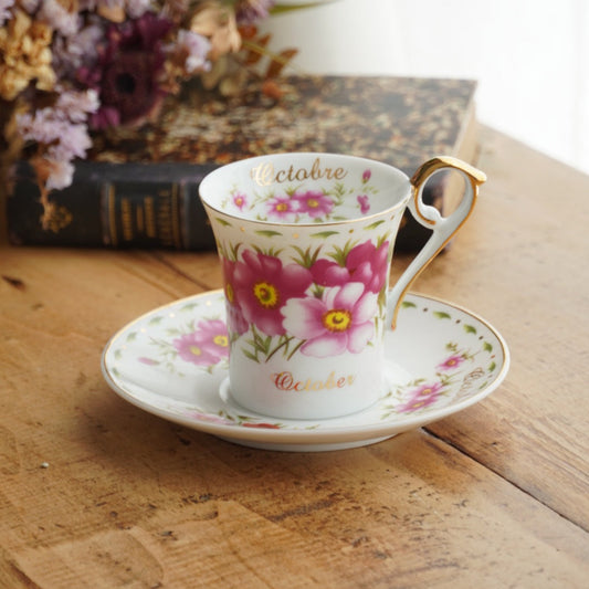 Tasse "Galice" du mois d'Octobre en porcelaine de Limoges fleuri et doré "So French" décor du Galion