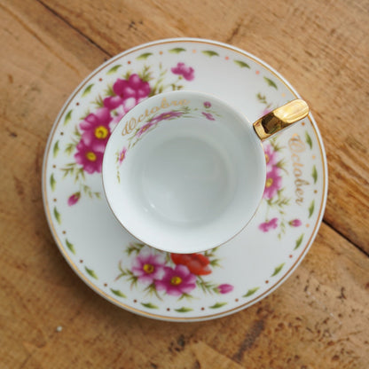 Tasse "Galice" du mois d'Octobre en porcelaine de Limoges fleuri et doré "So French" décor du Galion