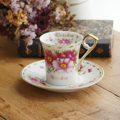 Tasse "Galice" du mois d'Octobre en porcelaine de Limoges fleuri et doré "So French" décor du Galion