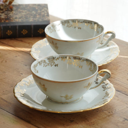 Tête-à-tête de tasses "Elielle" en porcelaine de luxe fleurie et dorée avec oiseaux