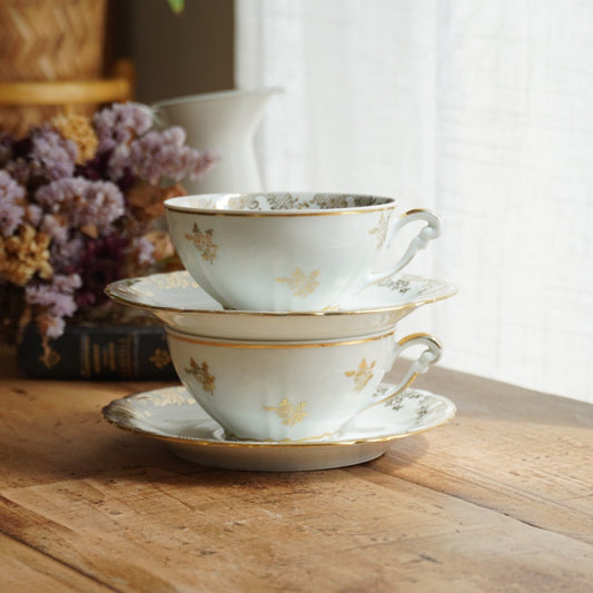 Tête-à-tête de tasses "Elielle" en porcelaine de luxe fleurie et dorée avec oiseaux