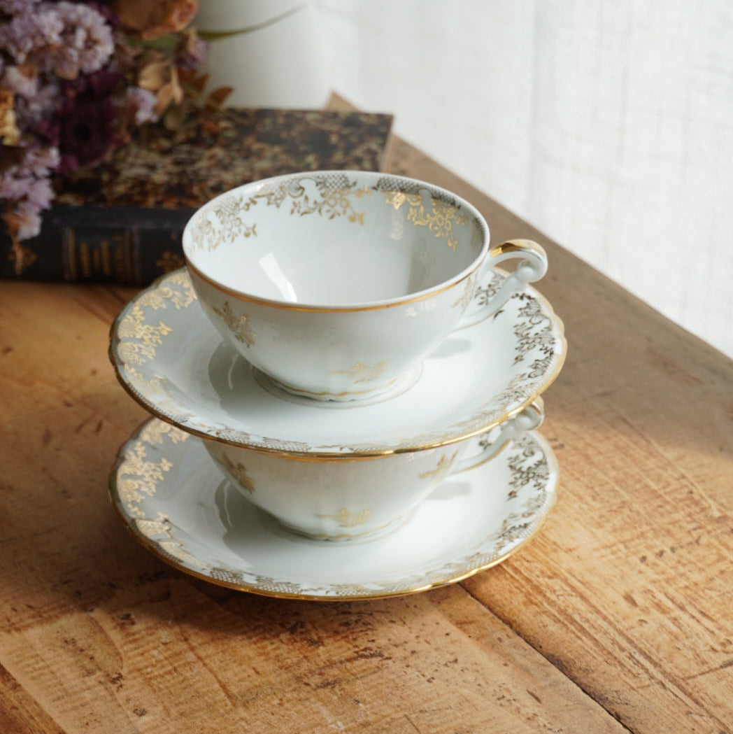 Tête-à-tête de tasses "Elielle" en porcelaine de luxe fleurie et dorée avec oiseaux
