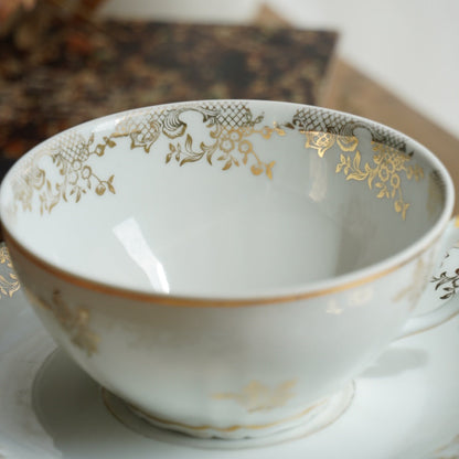 Tête-à-tête de tasses "Elielle" en porcelaine de luxe fleurie et dorée avec oiseaux