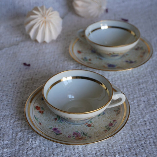 Tasses "Prudence" en porcelaine de Limoges fleuries et dorées (lot de 2)