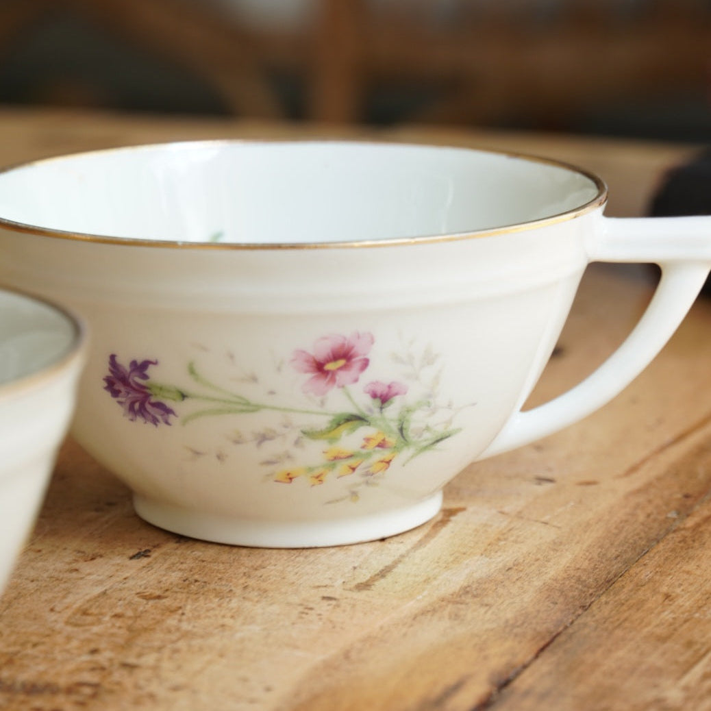 Tête-à-tête de tasses "Francine" en porcelaine fleurie et dorée de Limoges F.R.G
