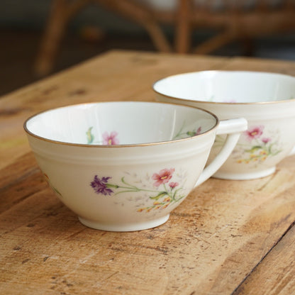Tête-à-tête de tasses "Francine" en porcelaine fleurie et dorée de Limoges F.R.G