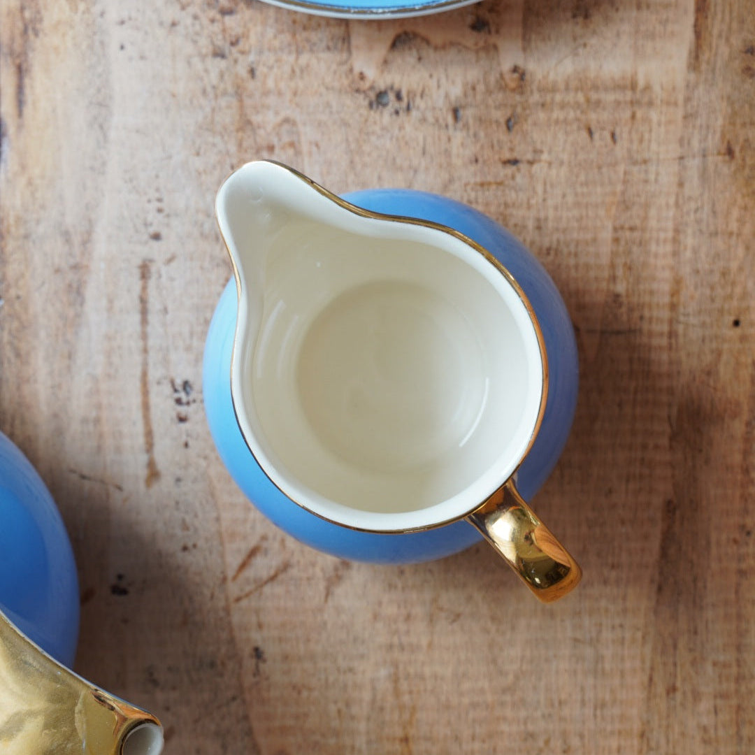 Service à thé ou à café solitaire "Fynn" en faïence allemande bleue et dorée Villeroy & Boch