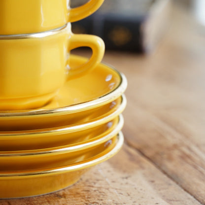 Ensemble de petites tasses bistrot "Ernelle" en porcelaine jaunes et dorées Yves Deshoulières Apilco (lot de 4) (rares)