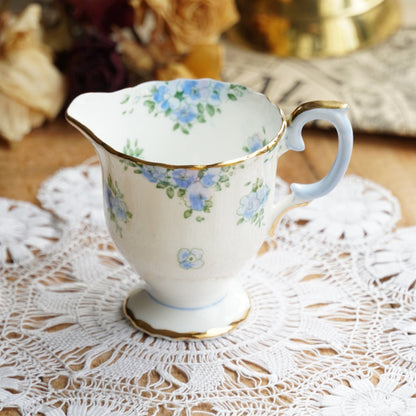 Service à thé "Merry" en porcelaine anglaise fleurie bleutée et dorée Crown Staffordshire