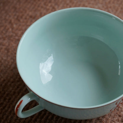 Tasse "Ragnetrude" à deux anses en porcelaine de Limoges Raynaud