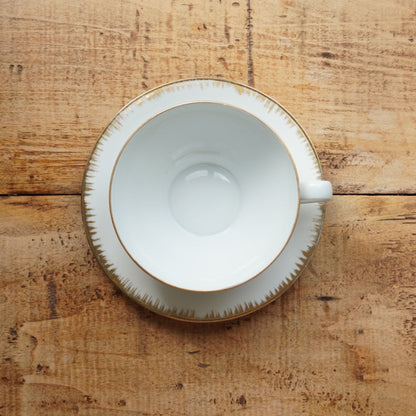 Grande tasse "Léonille" en porcelaine de Limoges blanche et dorée Singer
