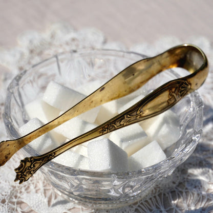 Pince à sucre "Cyrelle" en métal doré