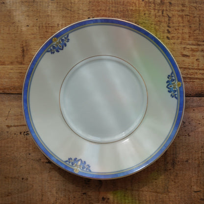 Tête-à-tête de grandes tasses "Rémiline" en porcelaine de Limoges bleutée et dorée Remy Delinières