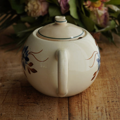 Théière "Béonie" en faïence française fleurie bleutée et orangée HBCM