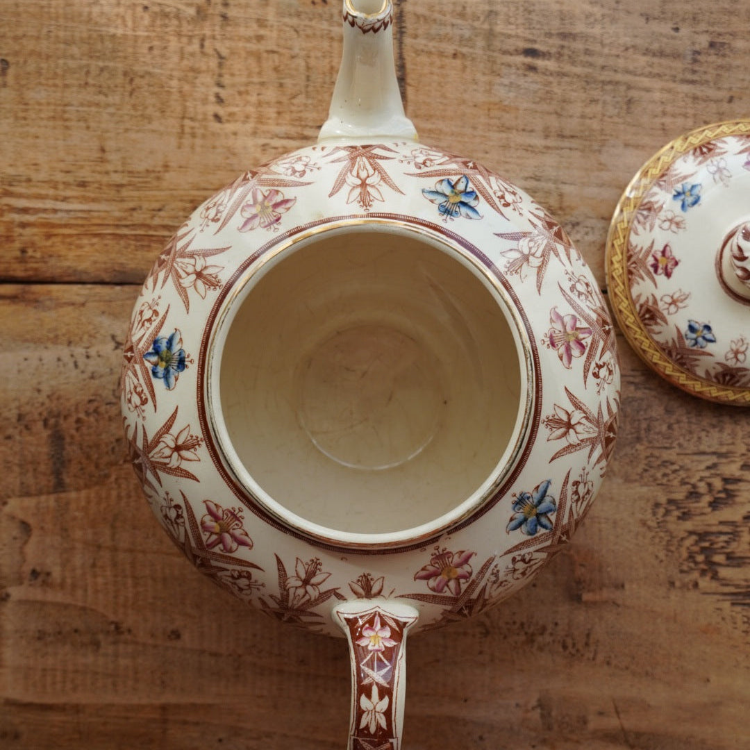 Théière "Gloriance" en terre de fer crème aux motifs géométriques et fleuris U&C modèle Derby (RARE)