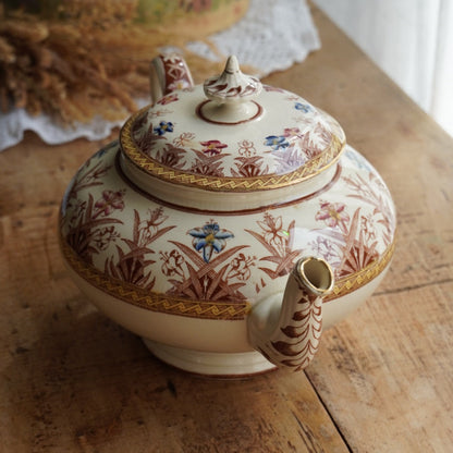 Théière "Gloriance" en terre de fer crème aux motifs géométriques et fleuris U&C modèle Derby (RARE)