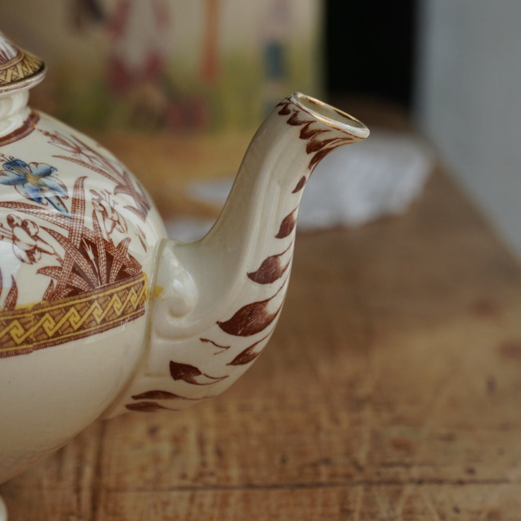Théière "Gloriance" en terre de fer crème aux motifs géométriques et fleuris U&C modèle Derby (RARE)