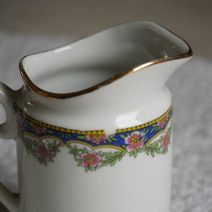 Pot à lait "Clotaire" en porcelaine de Limoges couronne bleuté, fleuri et doré