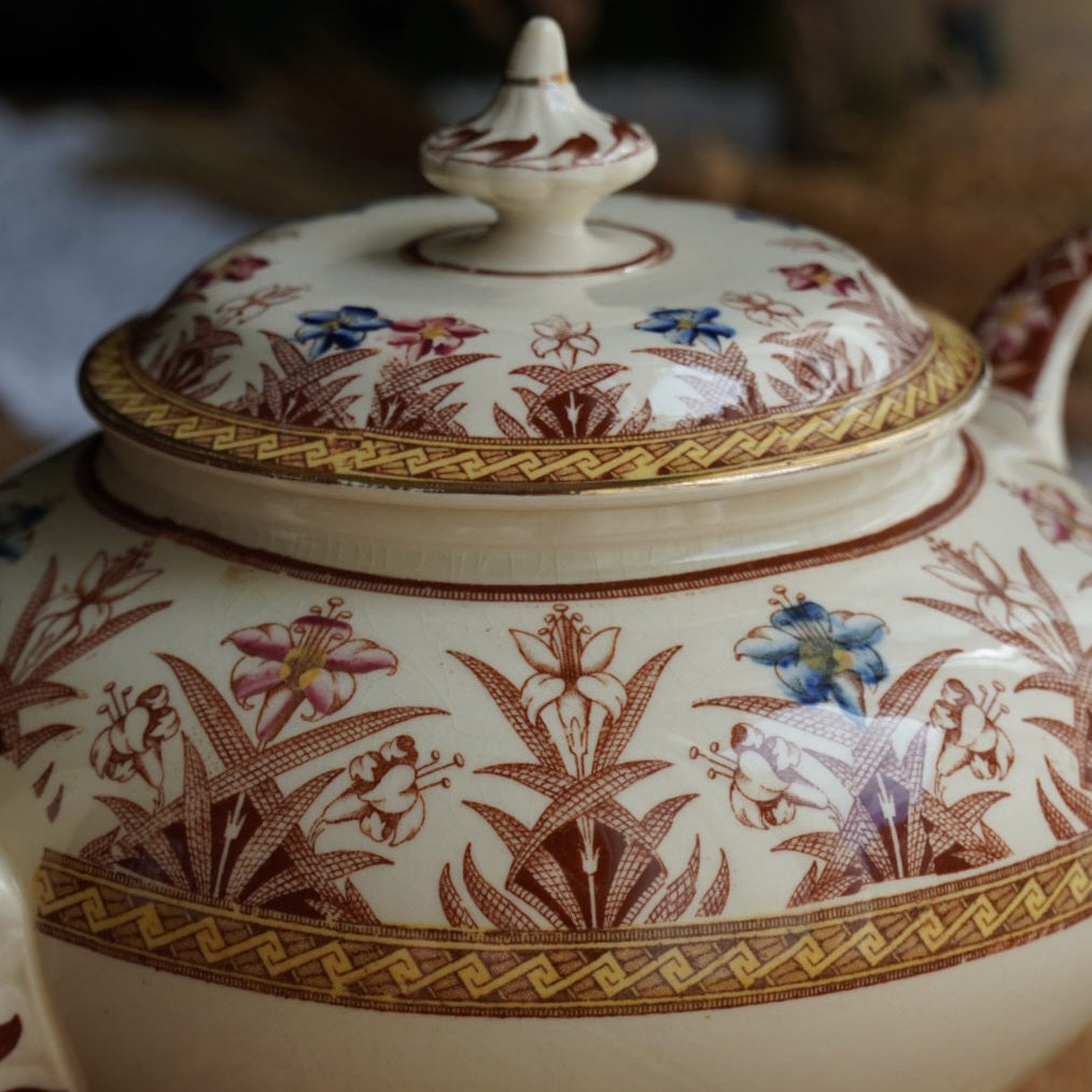 Théière "Gloriance" en terre de fer crème aux motifs géométriques et fleuris U&C modèle Derby (RARE)