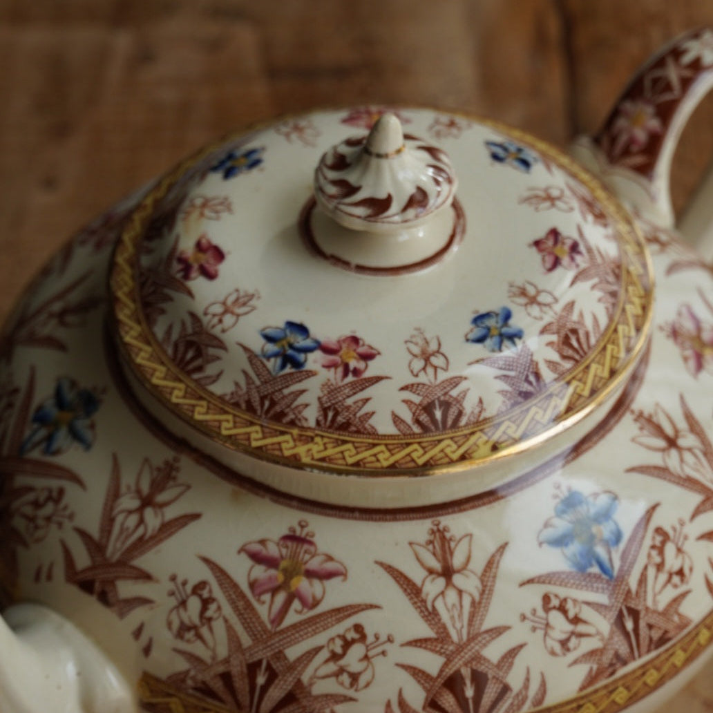 Théière "Gloriance" en terre de fer crème aux motifs géométriques et fleuris U&C modèle Derby (RARE)