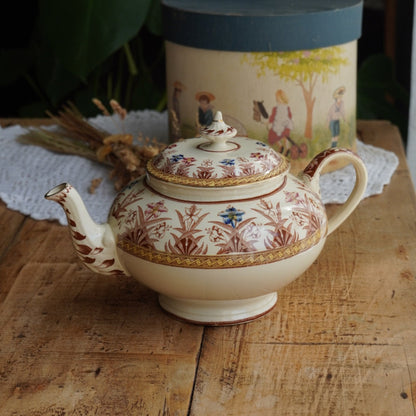Théière "Gloriance" en terre de fer crème aux motifs géométriques et fleuris U&C modèle Derby (RARE)
