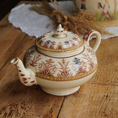 Théière "Gloriance" en terre de fer crème aux motifs géométriques et fleuris U&C modèle Derby (RARE)