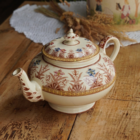 Théière "Gloriance" en terre de fer crème aux motifs géométriques et fleuris U&C modèle Derby (RARE)