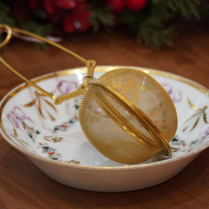 Case n°2 | Coupelle / repose sachet en porcelaine & pince à thé boule dorée