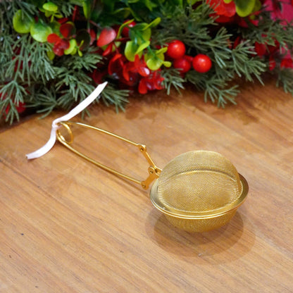 Case n°2 | Coupelle / repose sachet en porcelaine & pince à thé boule dorée