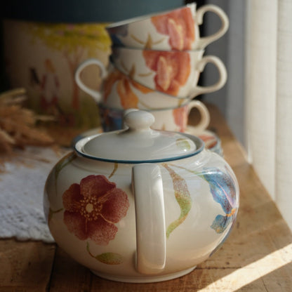 Service à thé "Phoebe" en porcelaine anglaise aux fleurs orangées et aux bordures bleutées Barratt's