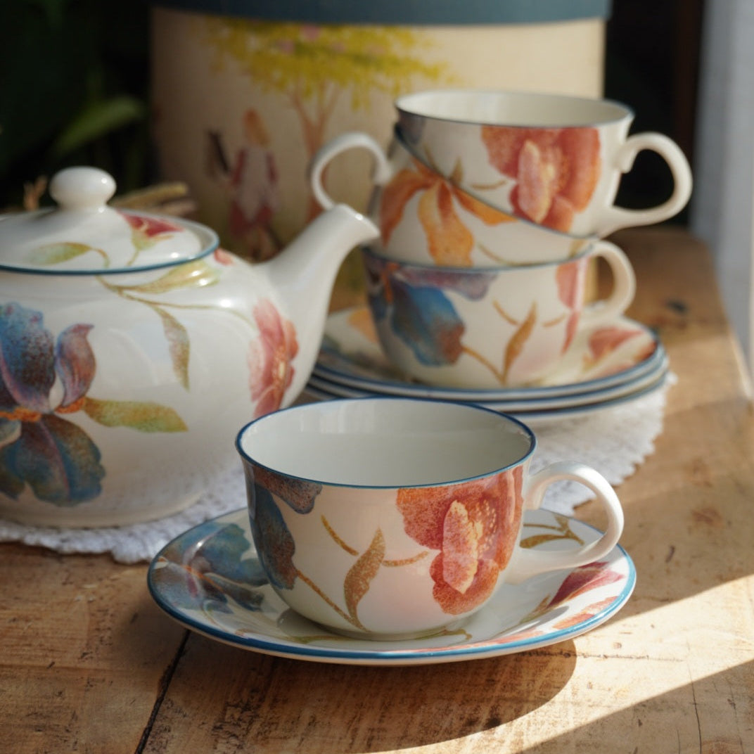 Service à thé "Phoebe" en porcelaine anglaise aux fleurs orangées et aux bordures bleutées Barratt's