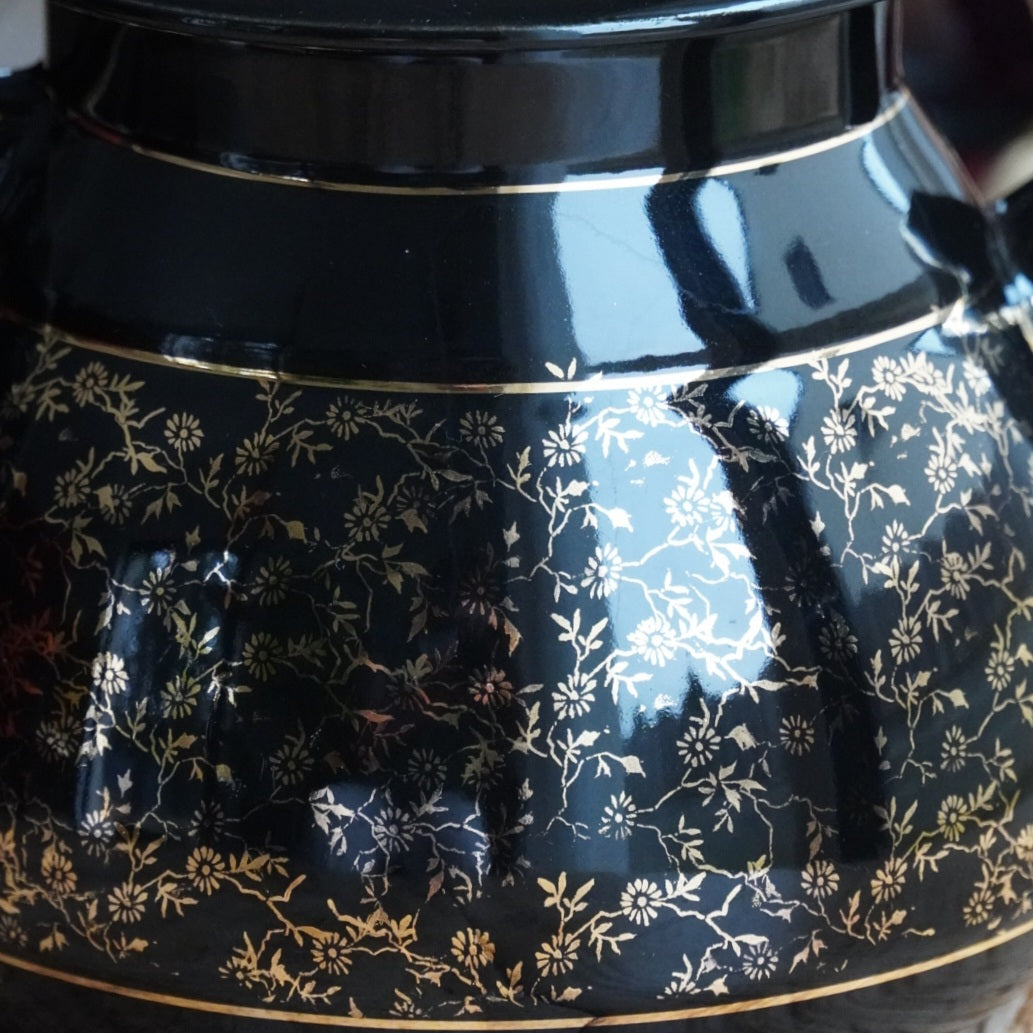 Théière ou cafetière "Théalie" en céramique française noire aux motifs fleuris dorés années 60/70