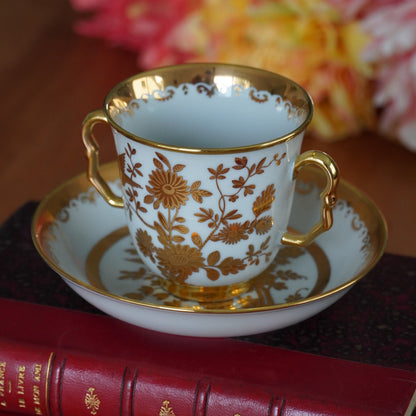 Petite tasse "Selina" à deux anses chololatière dorée en porcelaine Suisse