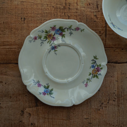 Grande tasse "Lauralice" en porcelaine de Limoges couleur crème, fleurie et dorée Ancienne Fabrique Royale de Limoges