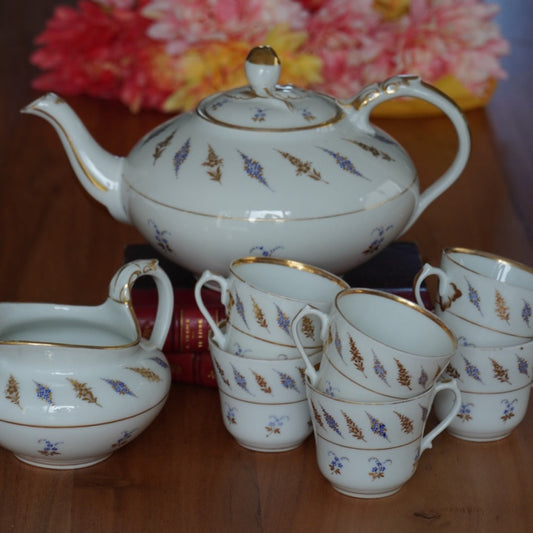 Service à thé "Paulette" en porcelaine française dorée avec motifs colorés