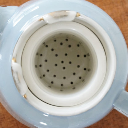 Théière "Thalie" et son filtre à thé en porcelaine de Limoges Aluminite Frugier bleu dégradé