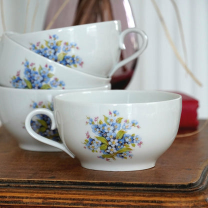 Tasses "Adelheid" en porcelaine motifs fleurs myosotis allemande Bavaria Schumann Arzberg Germany (lot de 4)