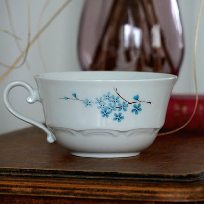 Tasse "Odet" en porcelaine allemande Schirnding Bavaria fleurie bleuté