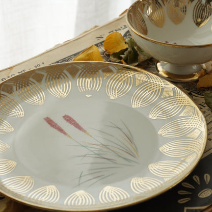 Tasse "Anina" en porcelaine allemande sur pied fleurie et dorée et son assiette à gâteau Bavaria Qualitäts-Porzellan