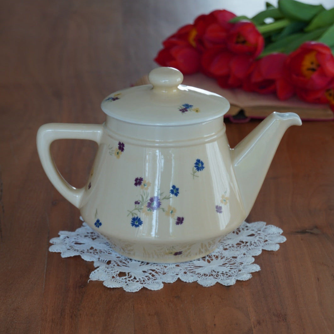 Théière "Fleurelle" en céramique jaune paille et fleurie des années 60/70