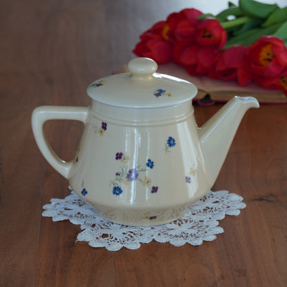 Théière "Fleurelle" en céramique jaune paille et fleurie des années 60/70