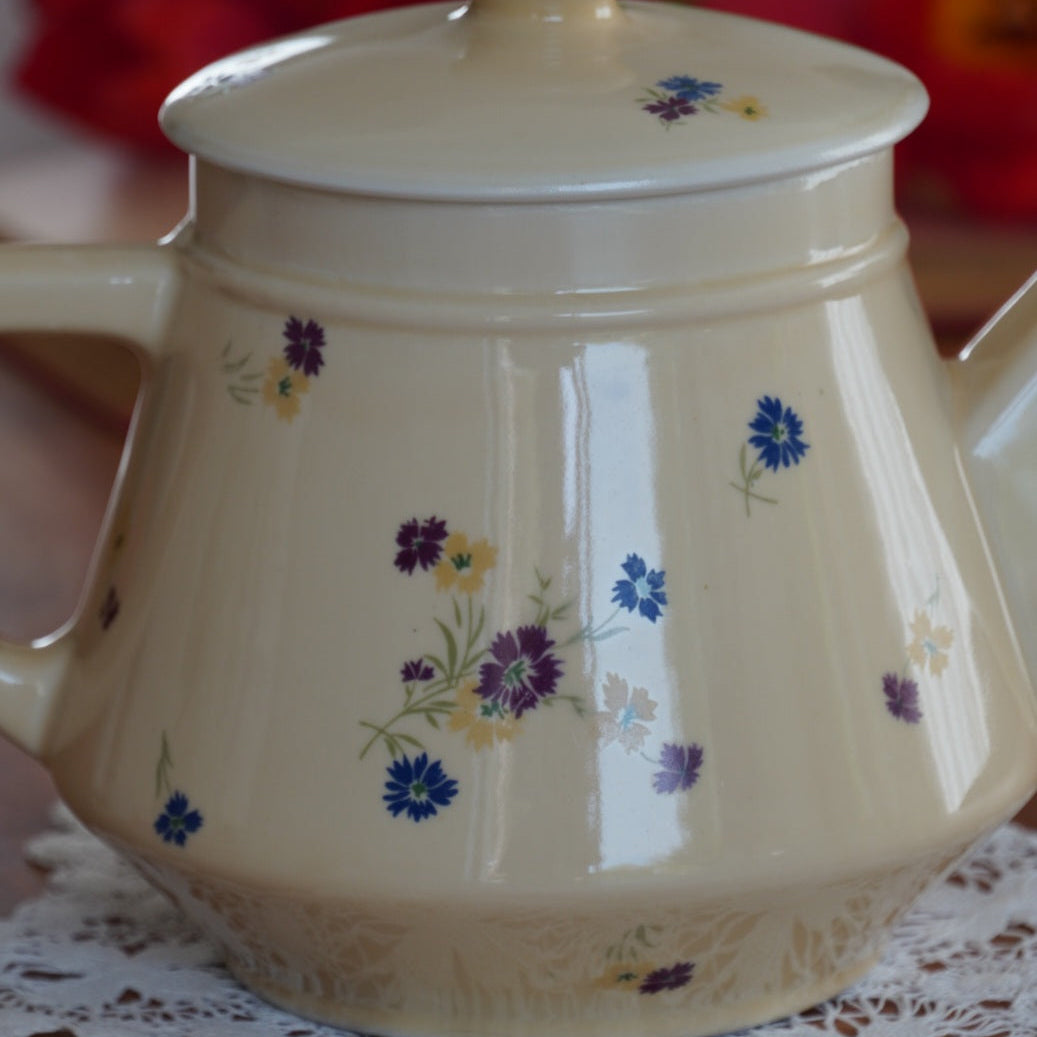 Théière "Fleurelle" en céramique jaune paille et fleurie des années 60/70