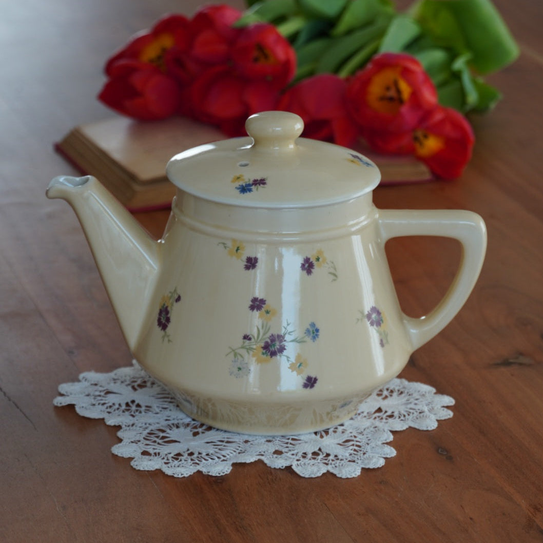 Théière "Fleurelle" en céramique jaune paille et fleurie des années 60/70