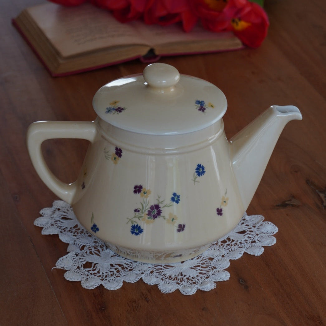 Théière "Fleurelle" en céramique jaune paille et fleurie des années 60/70