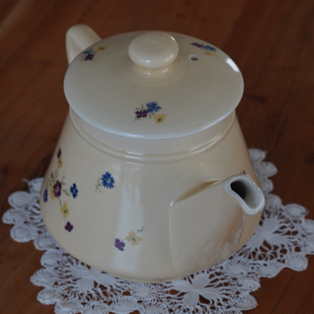 Théière "Fleurelle" en céramique jaune paille et fleurie des années 60/70