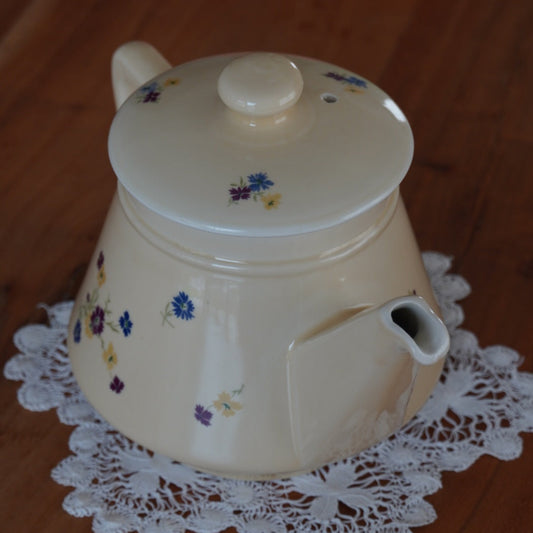 Théière "Fleurelle" en céramique jaune paille et fleurie des années 60/70